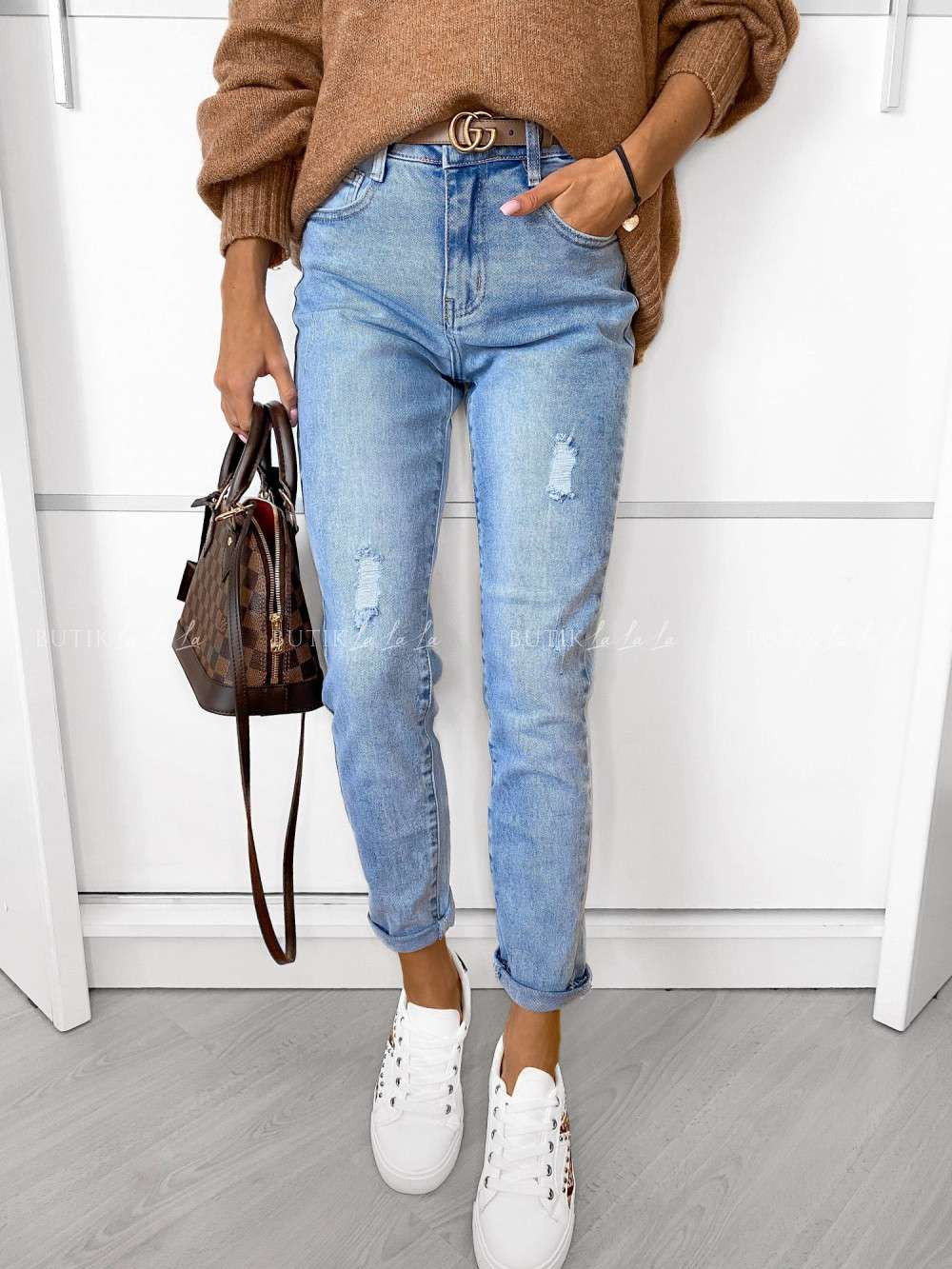 jeansy z&nbsp;przetarciami