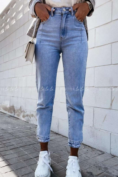Jasne jeansy z dziurami i wysokim stanem – dobierz do figury i noś stylowo!