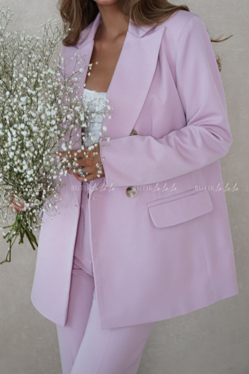 Spodnie materiałowe pudrowe Karmi 10