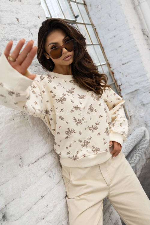 Bluza kremowa w brązowy print Friko